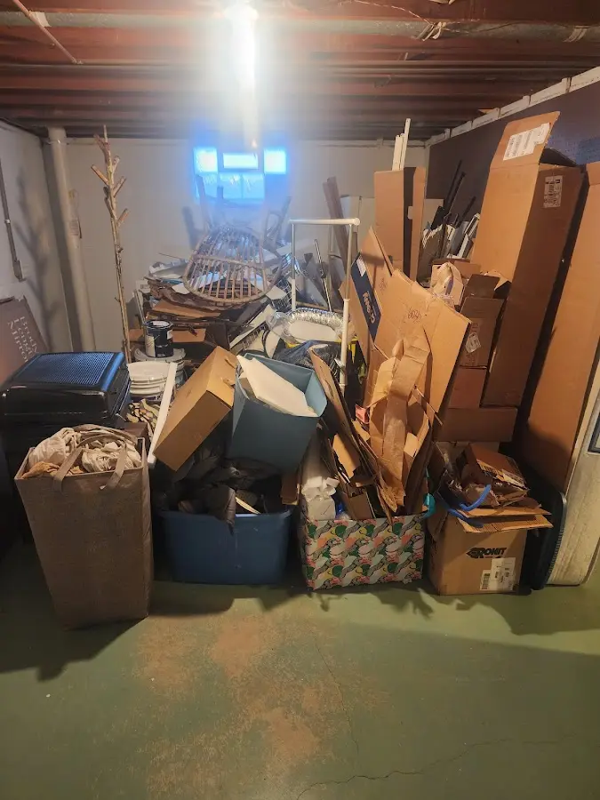 Roll-off dumpster container at job site for Cleanout Dumpster Rental in New Kingman-Butler